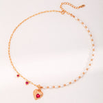 Gold Pearl Heart Necklace